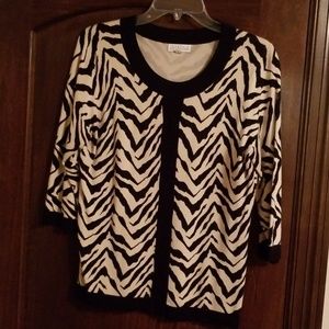 Zebra sweater size medium fashionable flattering